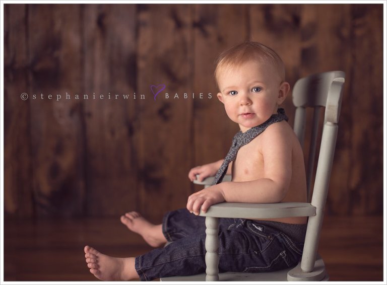 Close up of baby boy in rocking chair during his Markham baby photography session with Stephanie Irwin Photography
