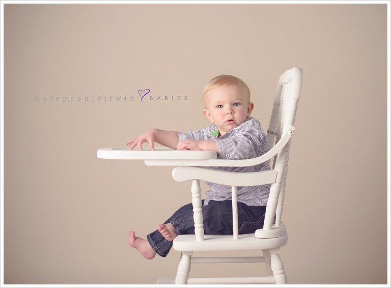 Markham baby photography session of baby boy in vintage high chair image