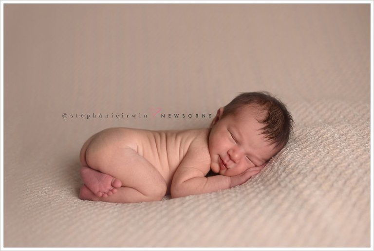Markham newborn photography of smiley baby boy
